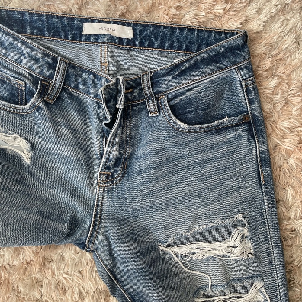 Distressed ripped lower rise Hidden Denim jeans